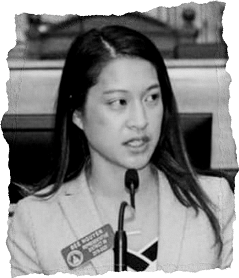 Bee Nguyen speaking at a podium